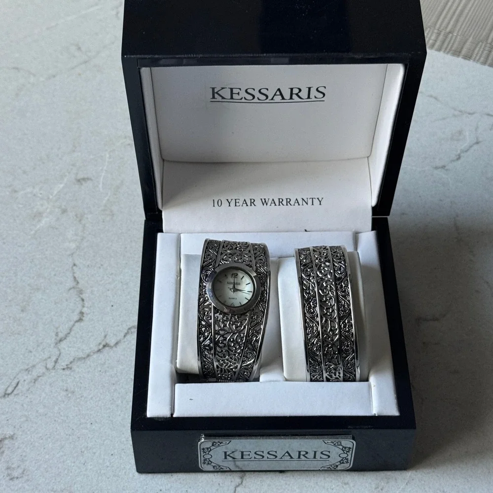 Kessaris Womens Silver Tone Filigree Cuff Watch and Matching Bangle Bracelet Set